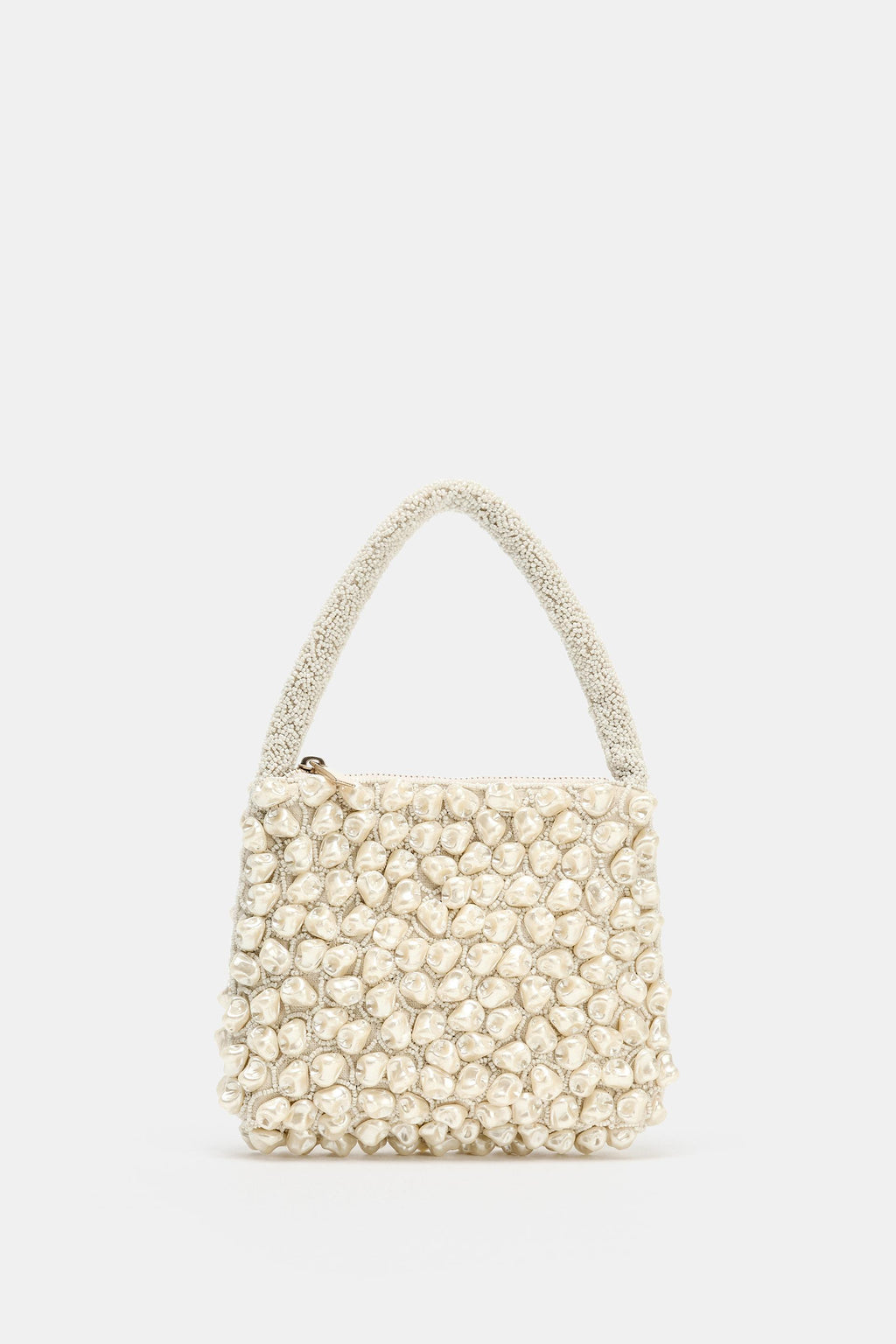 Irregular beaded clutch
