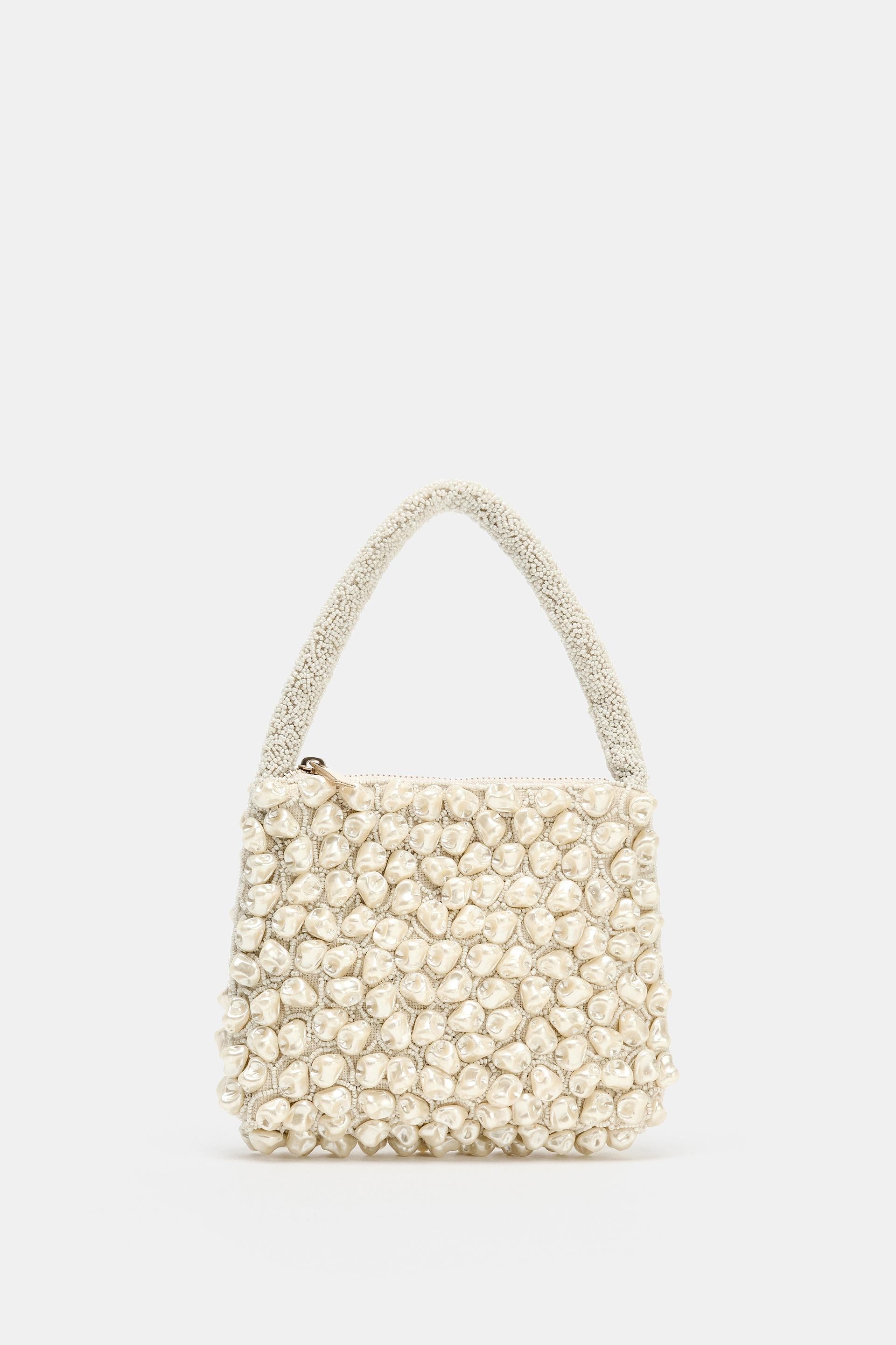 Irregular beaded clutch