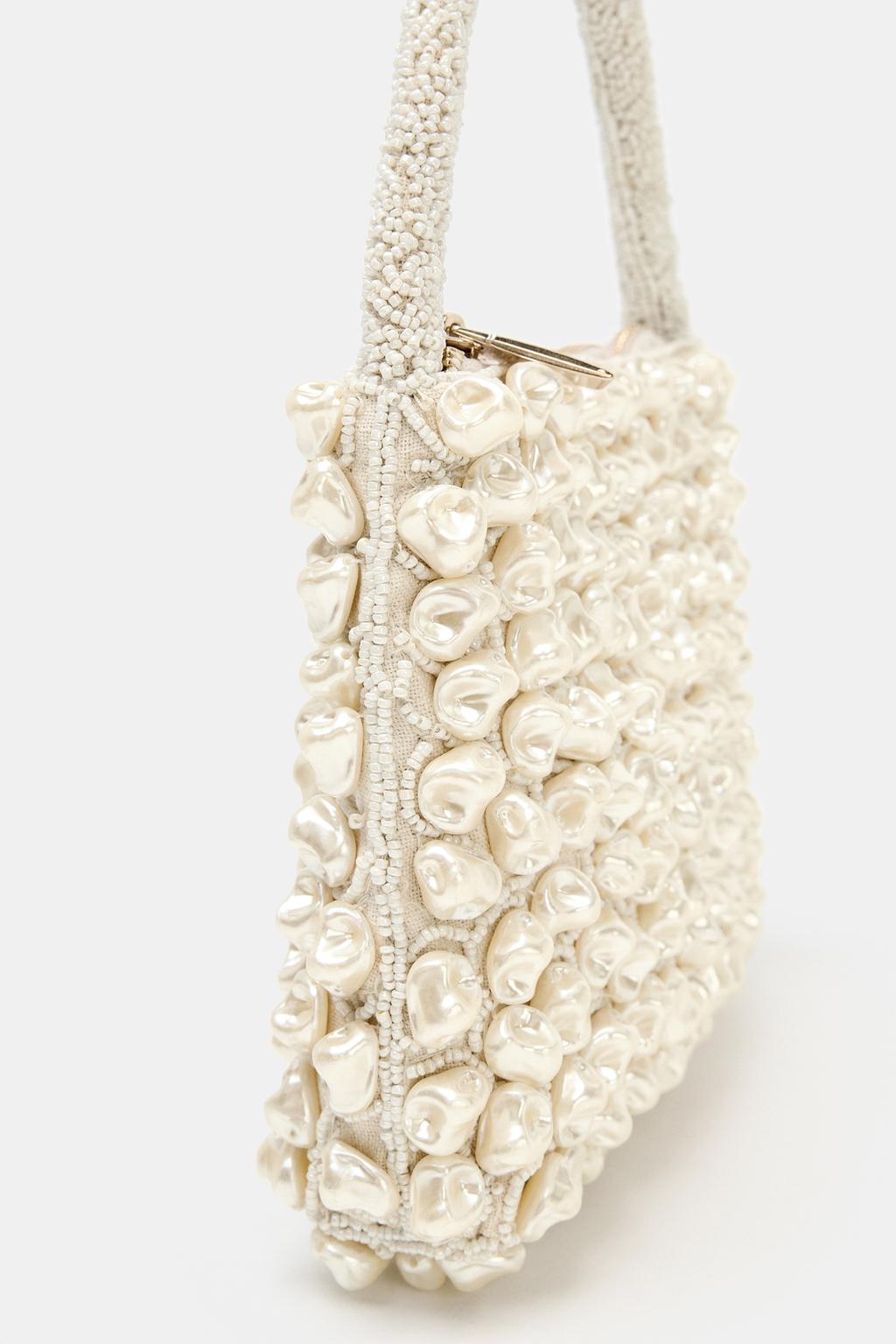 Irregular beaded clutch