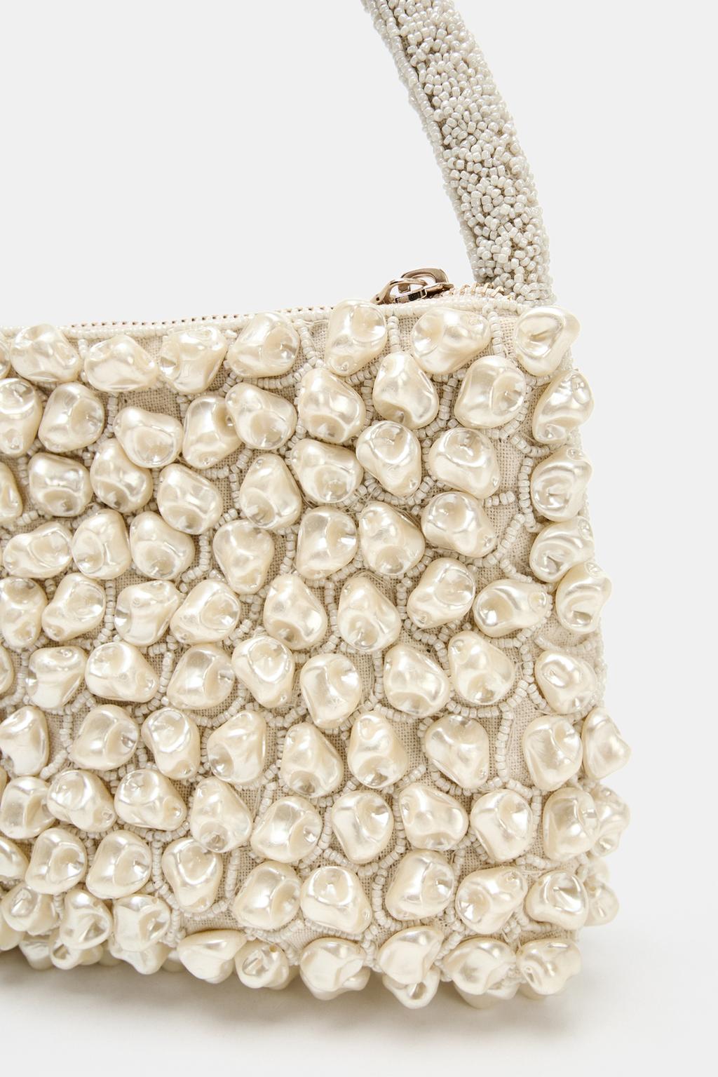 Irregular beaded clutch