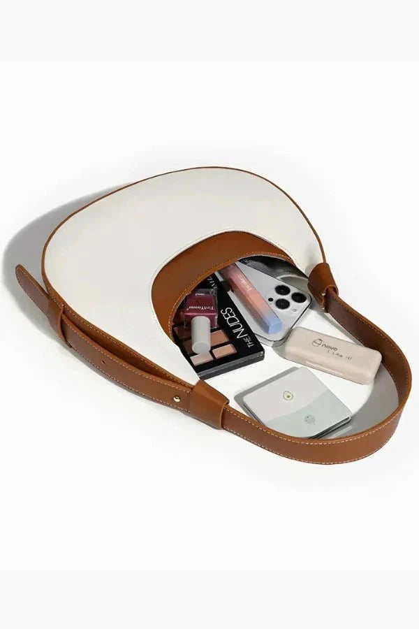 Half-moon shoulder and handbag