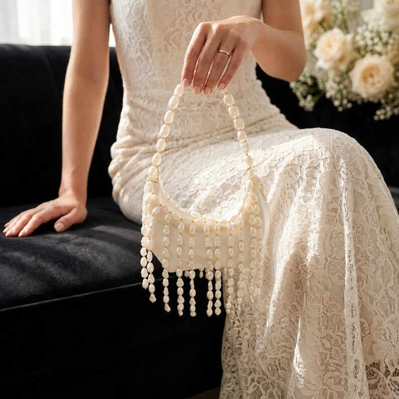Ivory pearl-embellished evening bag