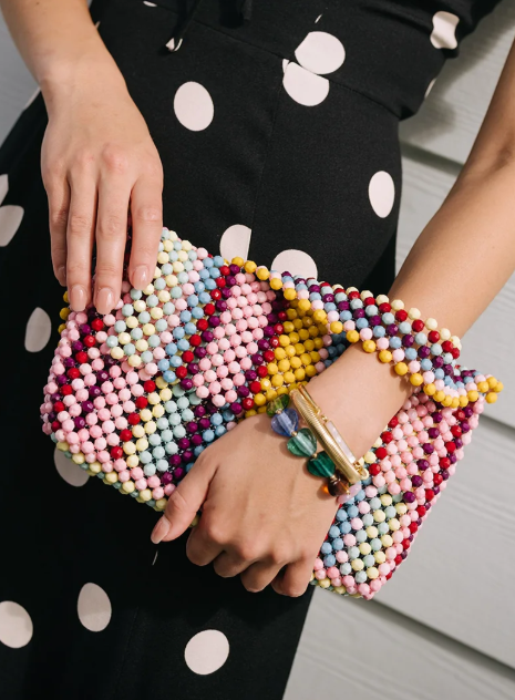 Exquisite beaded clutch with a rainbow color scheme.